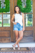 The Offset Button Down Sleeveless Top